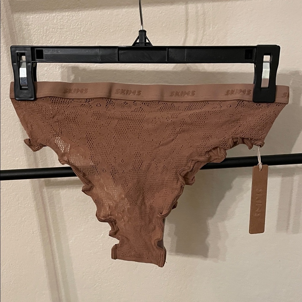 Skims cheeky brief in knit lace